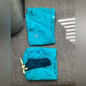 Figs scrubs. Too small , pants medium.